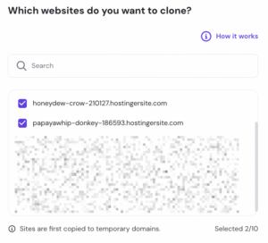 Hostinger site clone selection screen with two temporary domains checked