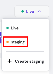 Environment menu with Live and highlighted staging option, plus Create staging action
