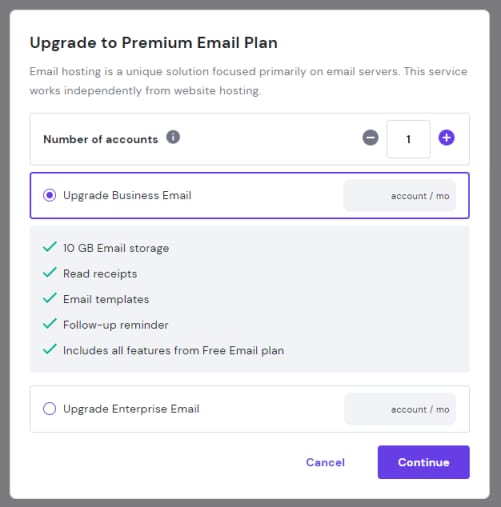 Hostinger email upgrade dialog with Upgrade Business Email option selected and Continue button