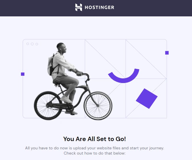Hostinger setup success screen with cyclist illustration and “You Are All Set to Go!” message