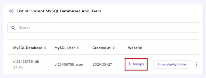 Hostinger MySQL databases list with the Assign button highlighted in the Website column